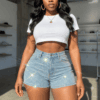 Woman-wearing-a-blue-short-denim-jeans-pants-with-rhinestones